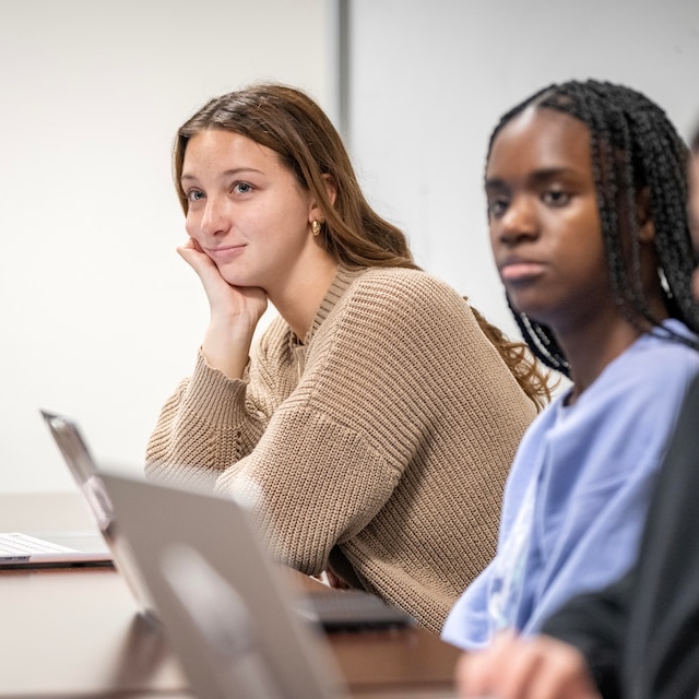 Two female students in Introduction to Women and Gender Studies course